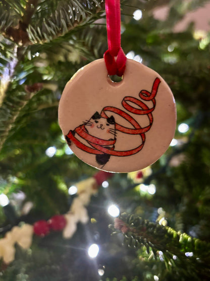 Holiday Cat Tangled in Ribbon Ceramic Ornament