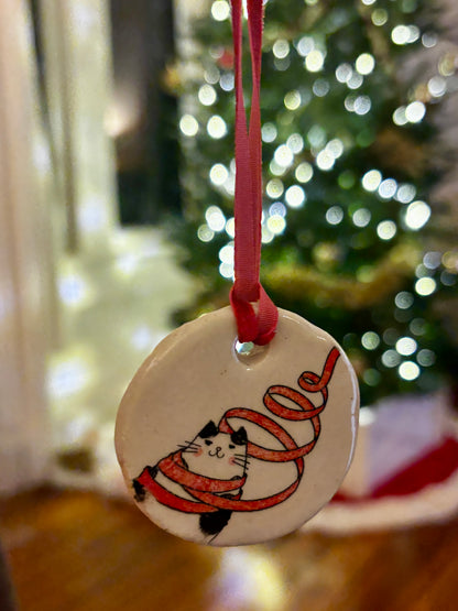 Holiday Cat Tangled in Ribbon Ceramic Ornament
